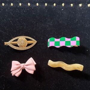 Set of Stylish Hair Clips in Pink, Gold, and Green
